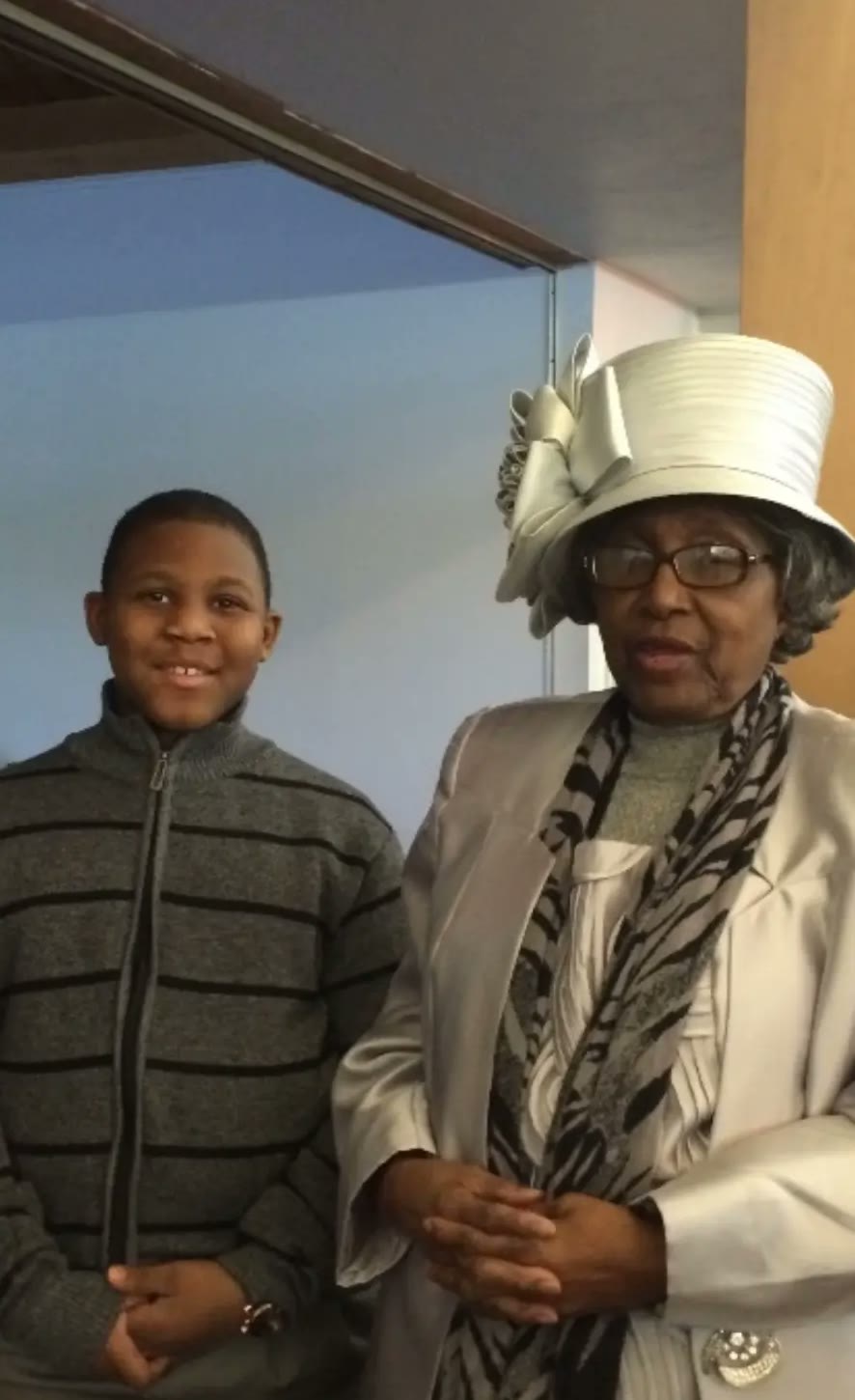 Minnie Linzy with one of her grandchildren at church