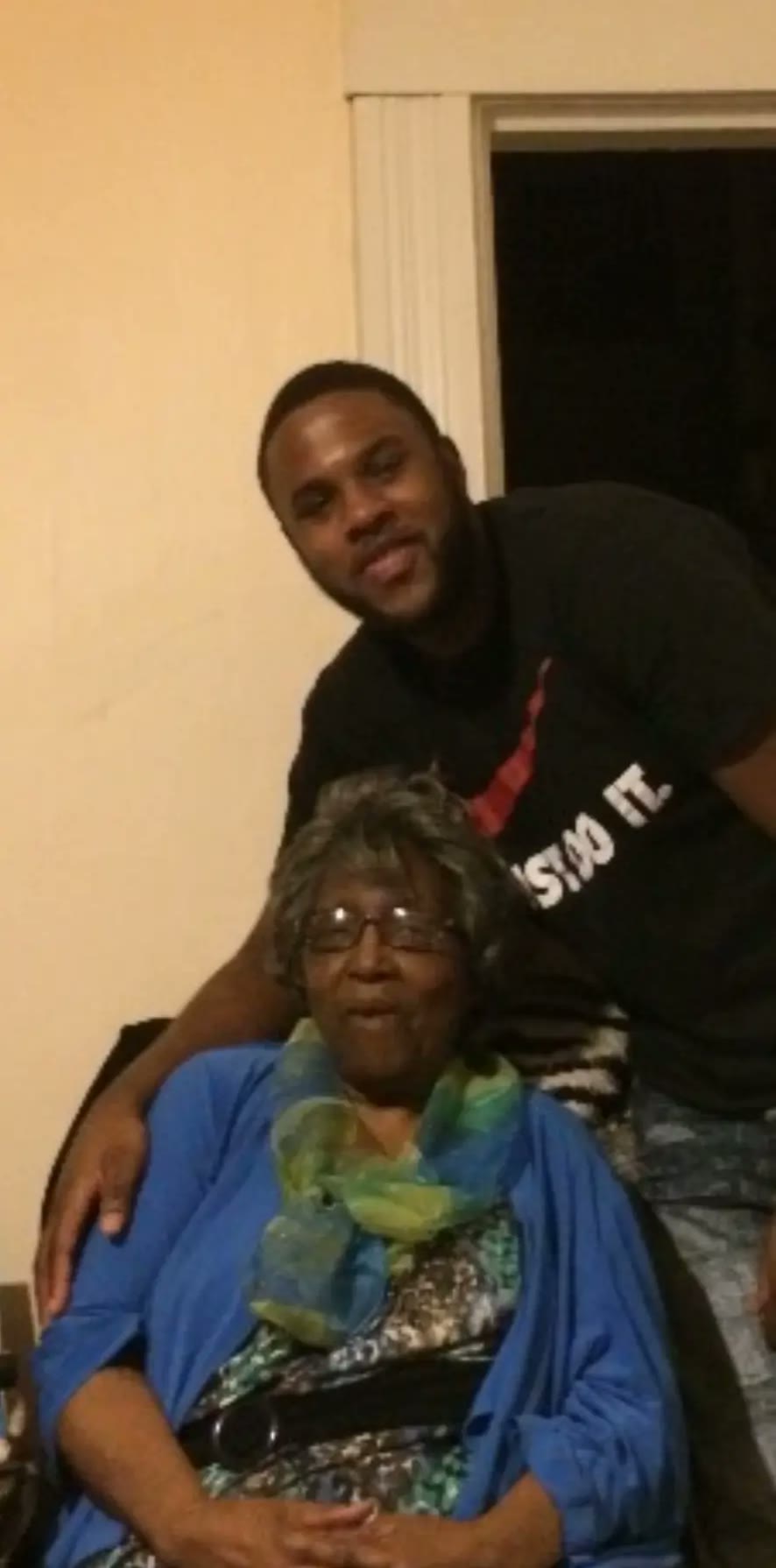 Minnie Linzy with one of her grandchildren at home